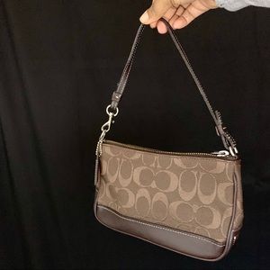 Brown coach mini baguette bag